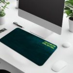 Infidu dark teal desk pad with yellow motivational quote and vintage textured design.
