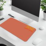 Infidu terracotta desk pad with bold motivational quote in yellow and red on warm orange background, minimalistic vintage art design.