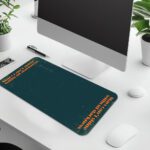 Infidu teal desk pad with vintage texture and vertical orange quote