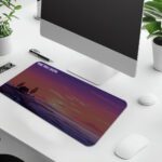 Infidu sunset desk pad with house silhouette and “MAKE TIME VALUE” quote on a warm purple-orange evening sky background.