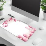 White desk pad with pink magnolia flowers and joyful scripture quote