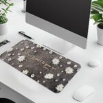 Dark grey desk pad featuring white daisies and the Bible verse "Ask and it shall be given to you" from Matthew 7:7 in golden cursive.