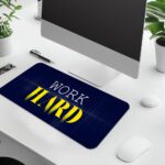 Infidu navy blue desk pad with bold “WORK HARD” text in white and yellow on a textured background.