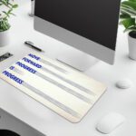 Infidu minimal cream desk pad with blue motivational quote "MOVE FORWARD PROGRESS IS PROGRESS" and subtle gray brush accents
