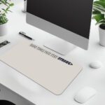 Infidu beige desk pad with motivational quote "HARD TIMES PASS STAY STRONG" and bold purple accent on a clean white background