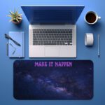 Vintage galaxy-themed desk pad with “MAKE IT HAPPEN” quote in pink over deep blue and purple night sky background.