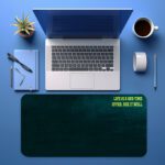 Infidu dark teal desk pad with yellow motivational quote and vintage textured design.