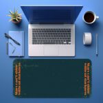 Infidu teal desk pad with vintage texture and vertical orange quote