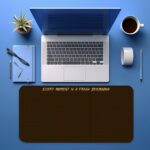 Infidu dark brown desk pad with handwritten motivational quote in light yellow.