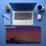 Infidu sunset desk pad with house silhouette and “MAKE TIME VALUE” quote on a warm purple-orange evening sky background.