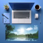 Infidu Calm Nature Desk Pad featuring a serene lake, green trees, and Philippians 4:4 Bible verse in white and light blue fonts.