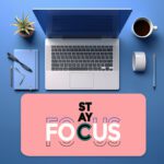 Infidu pastel pink desk pad with bold “STAY FOCUS” quote in colorful typography