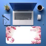 White desk pad with pink magnolia flowers and joyful scripture quote