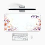 Infidu Trust God desk pad with pastel floral design and uplifting faith quote on a white background
