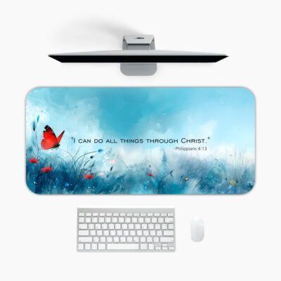Infidu desk pad with Bible verse Philippians 4:13, red butterfly, and soft blue meadow background.