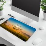 Infidu Sunrise Countryside Desk Pad featuring vintage art of green fields, glowing sunrise, and Bible verse "I can do all things through Christ."