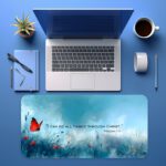 Infidu desk pad with Bible verse Philippians 4:13, red butterfly, and soft blue meadow background.