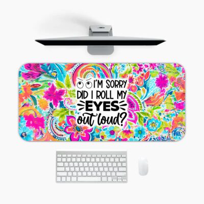 Infidu Fun Desk Pad featuring colorful abstract floral patterns and bold text “Did I Roll My Eyes Out Loud?” with a cartoon eye illustration.