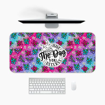 Infidu cheerful desk pad with unicorn, floral design, and the quote "Chase the Day You Deserve" on a purple-blue gradient background.