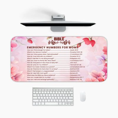 Infidu floral desk pad with soft pink and lavender blooms, featuring Bible emergency numbers for women on a light pink gradient background