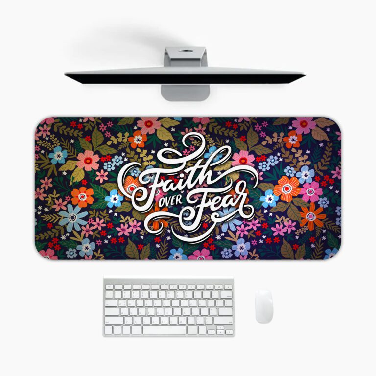 Dark desk pad with colorful red, pink, orange, blue, and purple flowers, featuring “Faith over Fear” in elegant white script, vintage art style.