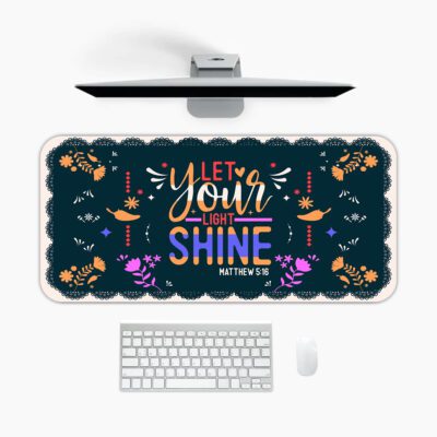 Dark floral desk pad with “Let Your Light Shine” quote, Matthew 5:16 reference, colorful flowers, and vintage art style on a navy background.