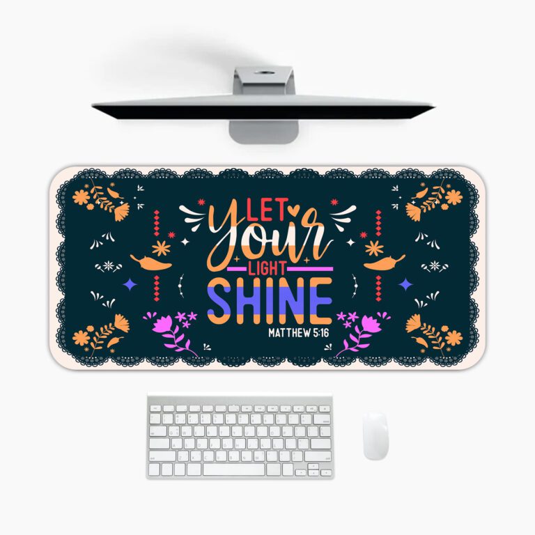 Dark floral desk pad with “Let Your Light Shine” quote, Matthew 5:16 reference, colorful flowers, and vintage art style on a navy background.