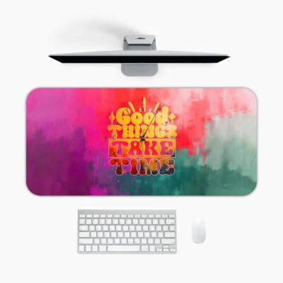 Desk pad with “Good Things Take Time” quote, colorful watercolor background, and retro font in a vintage art style.