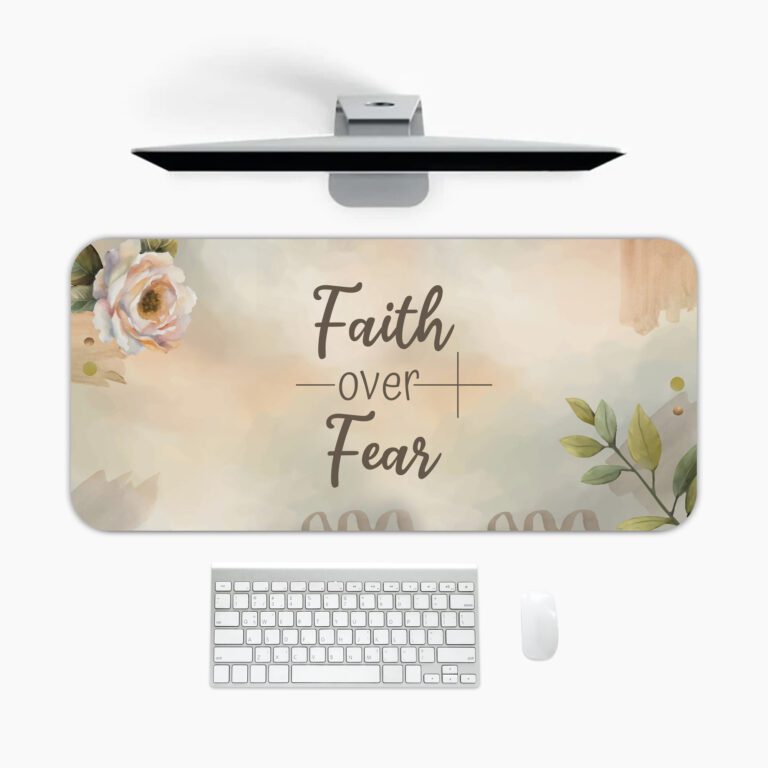 Pastel floral desk pad with “Faith over Fear” script, white rose, green leaves, and watercolor background in vintage art style.