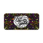Dark floral desk pad with kaleidoscope pattern in purple, green, and orange, featuring “Just Do Good” quote in white framed text, vintage art style.