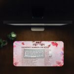 Infidu floral desk pad with soft pink and lavender blooms, featuring Bible emergency numbers for women on a light pink gradient background