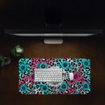 Infidu bold desk pad with bumblebee quote, pink and turquoise leopard print, and floral accents in a fun vintage art style.