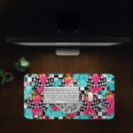 Infidu bold desk pad with colorful patterns and “Unleash the Energy” quote in a dynamic circular badge on a vibrant, high-energy background.