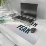 Watercolor desk pad with white flowers, pastel background, and bold “FAITH over FEAR” quote in vintage art style.