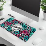 Infidu bold desk pad with bumblebee quote, pink and turquoise leopard print, and floral accents in a fun vintage art style.