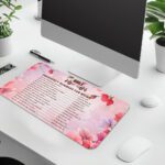 Infidu floral desk pad with soft pink and lavender blooms, featuring Bible emergency numbers for women on a light pink gradient background