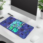 Infidu desk pad with “Out of Single Digits I’m 10” quote, peace sign, and playful floral patterns in vintage art style.