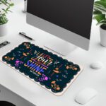 Dark floral desk pad with “Let Your Light Shine” quote, Matthew 5:16 reference, colorful flowers, and vintage art style on a navy background.