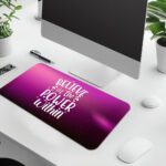 Purple gradient desk pad with sparkles and the quote “Believe in the power within” in white lettering, styled with vintage art flair.