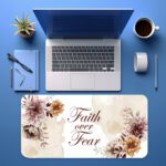 Infidu Elegant Floral Desk Pad featuring dusty pink and peach flowers with “Faith over Fear” quote on a cream watercolor background.