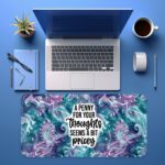 Infidu Ocean Desk Pad with seahorses, swirling ocean patterns, and bold quote on a colorful purple and teal background.