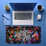 Dark desk pad with colorful red, pink, orange, blue, and purple flowers, featuring “Faith over Fear” in elegant white script, vintage art style.