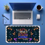 Dark floral desk pad with “Let Your Light Shine” quote, Matthew 5:16 reference, colorful flowers, and vintage art style on a navy background.
