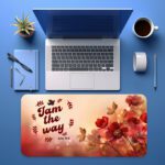Elegant desk pad with “I am the way – John 14:6” in bold red text, red flowers, golden leaves, and a soft cream-to-red gradient background.